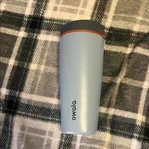 Owala Blue Tumbler with Orange and Gray Accents